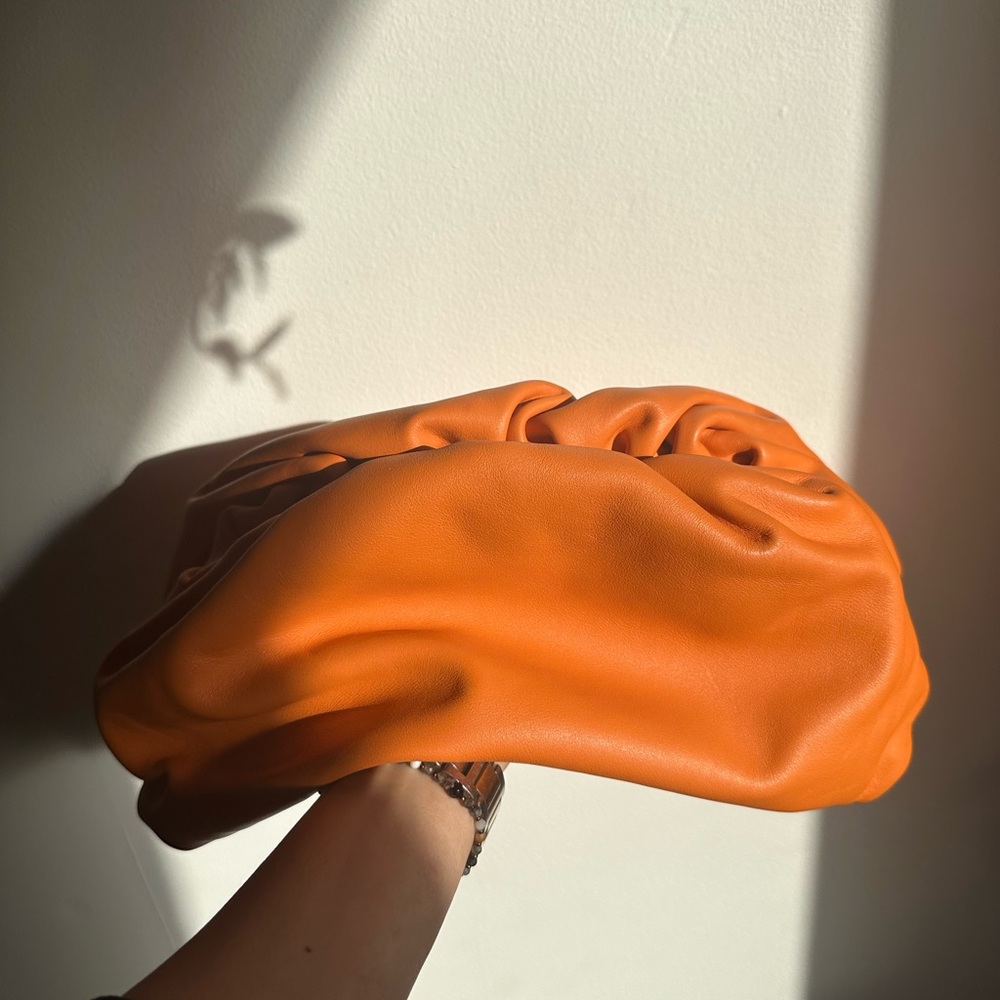 BOTTEGA - The POUCH - orange colour . Large size . 100% auth, includes dustbag.